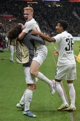 Goalscorer Hugo Larsson mi cheers with Ansgar Knauff right and Arthur Theate left photographed during the soccer Europa League match Eintracht Frankfurt vs Rigas AS on 24 10 2024 in Frankfurt DFL DFB REGULATIONS PROHIBIT ANY USE OF PHOTOGRAPHS as IMAGE SEQUENCES and or QUASI VIDEO