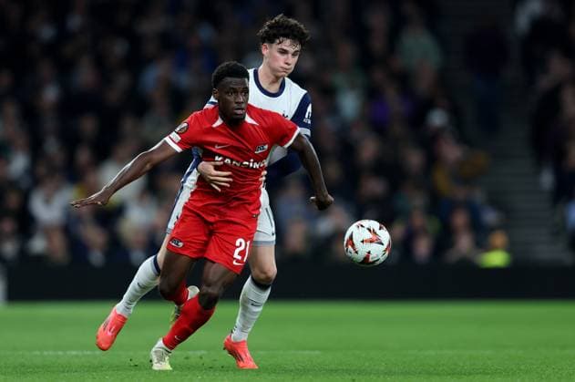 London, England, 24th October 2024. Ernest Poku of AZ Alkmaar and Archie Gray of Tottenham Hotspur challenge for the ball during the UEFA Europa League match at the Tottenham Hotspur Stadium, London. Picture credit should read: Paul Terry Sportimage EDITORIAL USE ONLY. No use with unauthorised audio, video, data, fixture lists, club league logos or live services. Online in-match use limited to 120 images, no video emulation. No use in betting, games or single club league player publications. SPI-3406-0044