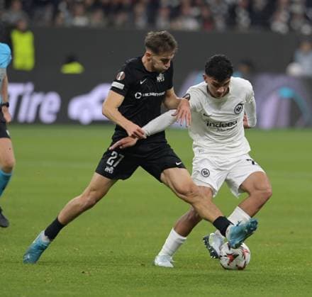 Can Uzun re vs Adam Markhiyev photographed at the soccer Europa League match Eintracht Frankfurt vs Rigas AS on 24 10 2024 in Frankfurt DFL DFB REGULATIONS PROHIBIT ANY USE OF PHOTOGRAPHS as IMAGE SEQUENCES and or QUASI VIDEO