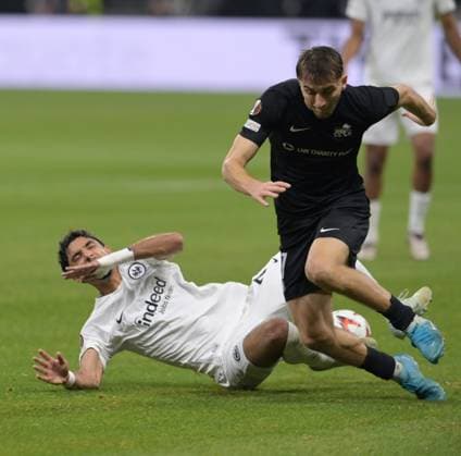 Omar Marmoush li against Adam Markhiyev photographed at the soccer Europa League match Eintracht Frankfurt vs Rigas AS on 24 10 2024 in Frankfurt DFL DFB REGULATIONS PROHIBIT ANY USE OF PHOTOGRAPHS as IMAGE SEQUENCES and or QUASI VIDEO