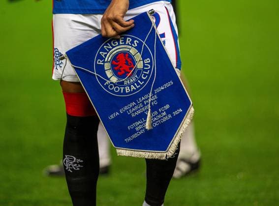24th October 2024; Ibrox Stadium, Glasgow, Scotland; UEFA Europa League Football, Rangers versus FCSB; Rangers match pennant in the hands of captain Tavernier  ActionPlus12706929 VagelisxGeorgariou