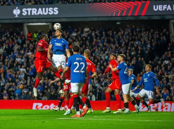 24th October 2024; Ibrox Stadium, Glasgow, Scotland; UEFA Europa League Football, Rangers versus FCSB; Leon Balogun of Rangers wins the header as Joyskim Dawa of FCSB challenges  ActionPlus12706958 VagelisxGeorgariou