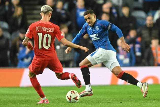 Rangers v Fotbal Club FCSB UEFA Europa League James Tavernier of Rangers and Octavian Popescu of Fotbal Club FCSB during the UEFA Europa League match at Ibrox Stadium, Glasgow UK Newspapers OUT Copyright: xJamiexJohnstonx FIL-20822-0134