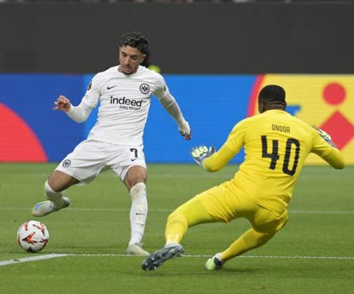 Omar Marmoush against goalkeeper Ondoa photographed at the soccer Europa League match Eintracht Frankfurt against Rigas AS on 24 10 2024 in Frankfurt DFL DFB REGULATIONS PROHIBIT ANY USE OF PHOTOGRAPHS as IMAGE SEQUENCES and or QUASI VIDEO