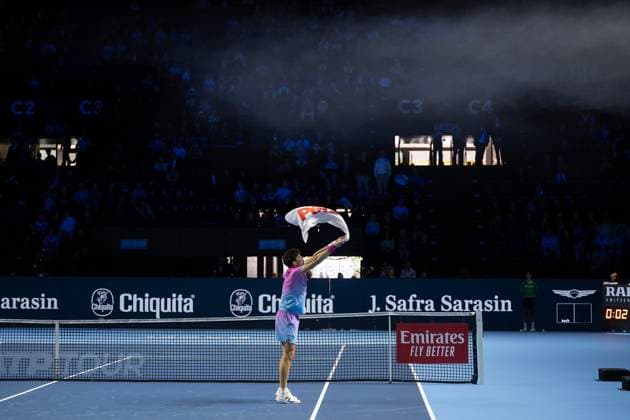 25th October 2024; St. Jakobshalle, Basel, Switzerland; ATP, Tennis Herren 500 Swiss Indoors Basel Tennis, Day 5; Ben Shelton (USA) uses a towel to try and clear the smoke caused by the players entrance pyrotechnics before the match against Andrey Rublev (RUS) in the quarter finals  ActionPlus12707335 DavidxEmm