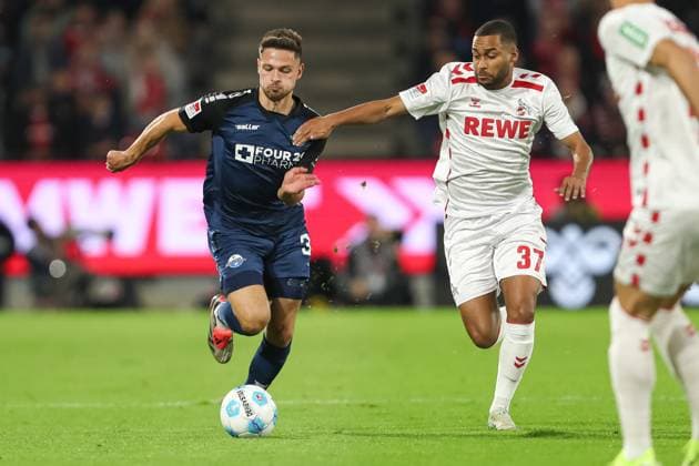 Marcel Hoffmeier SC Paderborn and Linton Maina 1 FC Koeln in a duel during the 2 Bundesliga match between 1 FC Koeln and SC Paderborn 07, RheinEnergieStadion on October 25, 2024 in Cologne, Germany Photo by Oliver Kaelke DeFodi Images Marcel Hoffmeier SC Paderborn and Linton Maina 1 FC Koeln battle for the ball during the 2 Bundesliga match between 1 FC Koeln and SC Paderborn 07 at RheinEnergieStadion on October 25, 2024 in Cologne, Germany Photo by Oliver Kaelke DeFodi Images DFL regulations prohibit any use of photographs as image sequences and or quasi video not used in POL SRB CRO FRA GBR NED ITA USA Defodi 678 2024 10 25 OK FCKSCP 0435 Defodi-678 not used in POL SRB CRO FRA GBR NED ITA USA DFL regulations prohibit any use of photographs as image sequences and or quasi-video.