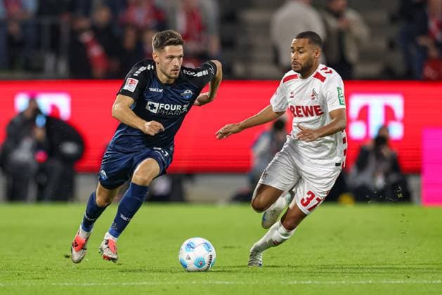 Cologne, Germany, 25 10 24 Marcel Hoffmeier SC Paderborn and Linton Maina 1 FC Koeln fighting for the ball during the 2 Bundesliga match between 1 FC Köln SC Paderborn at RheinEnergieSTADION on October 25, 2024 in Cologne, Germany Köln ReihnEnergieSTADION Germany Copyright: xStefanxBrauerx xBrauer-Fotoagentx