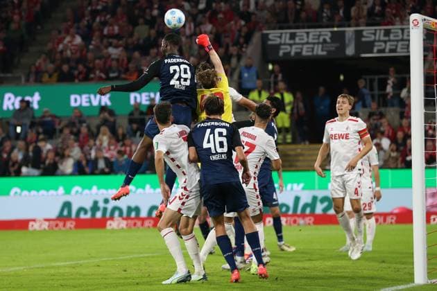 Ilyas Ansah SC Paderborn and goalkeeper Jonas Urbig 1 FC Koeln in a duel during the 2 Bundesliga match between 1 FC Koeln and SC Paderborn 07, RheinEnergieStadion on October 25, 2024 in Cologne, Germany Photo by Oliver Kaelke DeFodi Images Ilyas Ansah SC Paderborn and goalkeeper Jonas Urbig 1 FC Koeln battle for the ball during the 2 Bundesliga match between 1 FC Koeln and SC Paderborn 07 at RheinEnergieStadion on October 25, 2024 in Cologne, Germany Photo by Oliver Kaelke DeFodi Images DFL regulations prohibit any use of photographs as image sequences and or quasi video not used in POL SRB CRO FRA GBR NED ITA USA Defodi 678 2024 10 25 OK FCKSCP 1228 Defodi-678 not used in POL SRB CRO FRA GBR NED ITA USA DFL regulations prohibit any use of photographs as image sequences and or quasi-video.