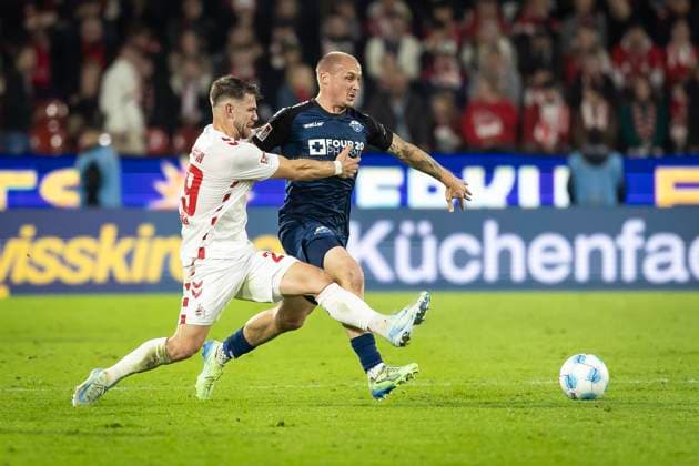 1 FC Köln SC Paderborn 07, 25 10 2024 Jan Thielmann 1 FC Köln, 29 tackles Sven Michel SC Paderborn 07, 11 from 10 Matchday of the 2 Soccer Bundesliga, 1 FC Köln SC Paderborn 07 on 25 10 2024 at the RheinEnergie Stadium in Cologne THE DFL REGULATIONS PROHIBIT ANY USE OF PHOTOS AS PICTURE SEQUENCES AND OR QUASI VIDEO Copyright: xBEAUTIFULxSPORTS AxelxKohringx