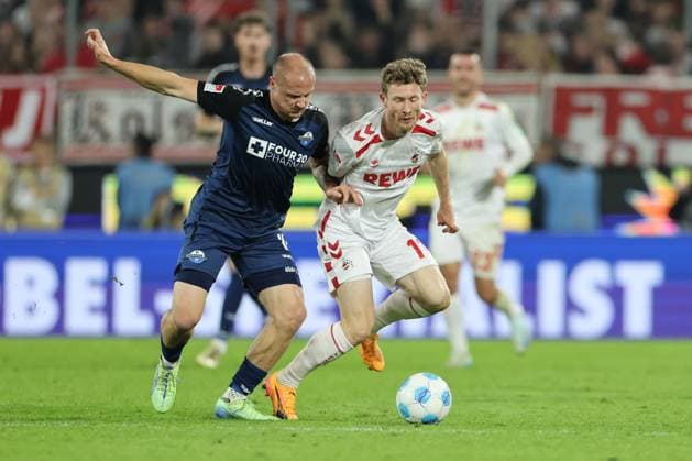 GER, 2 FBL 1 FC Koeln vs SC Paderborn 25 10 2024, Rheinenergie Stadion, Koeln, GER, 2 FBL 1 FC Koeln vs SC Paderborn, in the picture Florian Kainz FC Koeln 11 , in a duel against Sven Michel Paderborn 11 , nordphotoxGmbHx xMeuter nph00351
