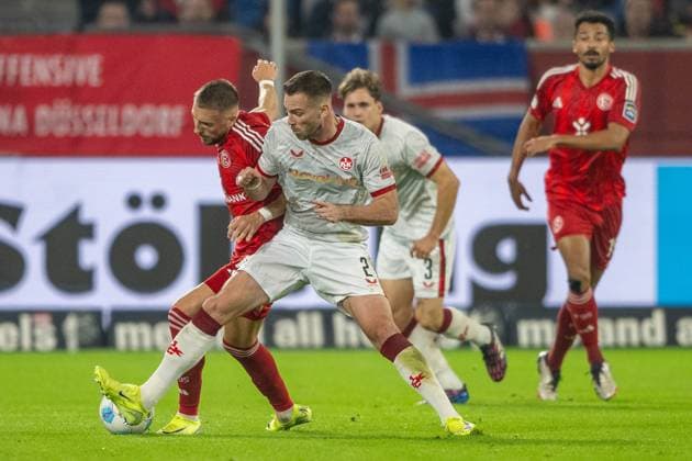 26 10 2024, Soccer 2 Bundesliga, Season 2024 2025, Matchday 10, Fortuna Duesseldorf vs 1 FC Kaiserslautern in the Merkur Spiel Arena in Duesseldorf duel between Jona Niemiec Fortuna Duesseldorf, 18 and Boris Tomiak 1 FC Kaiserslautern, 02 Important note In accordance with the regulations of the DFL German Football League and the DFB German Football Association, it is prohibited to utilize or have utilized photographs taken in the stadium and or of the match in the form of sequential images and or video-like photo series Foto Kirchner Media TH Copyright: xKirchner-Media THx
