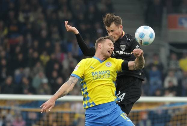 Sebastian Polter Eintracht Braunschweig , Niko Koulis Preussen Muenster Football, Men, Season 2024 2025 2 BL, Eintracht Stadion, Eintracht Braunschweig vs Preussen Muenster DFL REGULATIONS PROHIBIT ANY USE OF PHOTOGRAPHS AS IMAGE SEQUENCES AND OR QUASI VIDEO