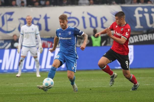 27 10 2024, xgox, Soccer 2 Bundesliga, 1 FC Magdeburg Hannover 96 emspor, v l Marcus Mathisen Magdeburg, 16 , Nicolo Tresoldi Hannover, 9 DFL DFB REGULATIONS PROHIBIT ANY USE OF PHOTOGRAPHS as IMAGE SEQUENCES and or QUASI VIDEO Magdeburg