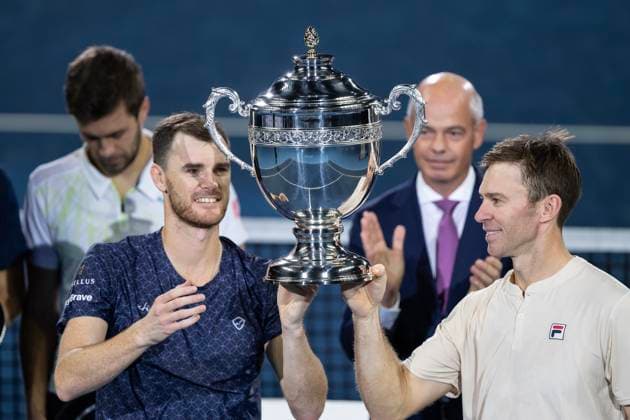 27th October 2024; St. Jakobshalle, Basel, Switzerland; ATP, Tennis Herren 500 Swiss Indoors Basel Tennis, Day 7; Jamie Murray (GBR) and John Peers (AUS) lift the winners trophy after the match against Wesley Koolhof (NED) and Nikola Metic (CRO) in the final of the doubles  ActionPlus12709102 DavidxEmm