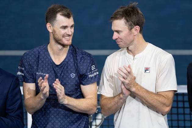 27th October 2024; St. Jakobshalle, Basel, Switzerland; ATP, Tennis Herren 500 Swiss Indoors Basel Tennis, Day 7; Jamie Murray (GBR) and John Peers (AUS) share a smile during the trophy ceremony after winning the match against Wesley Koolhof (NED) and Nikola Metic (CRO) in the final of the doubles  ActionPlus12709104 DavidxEmm