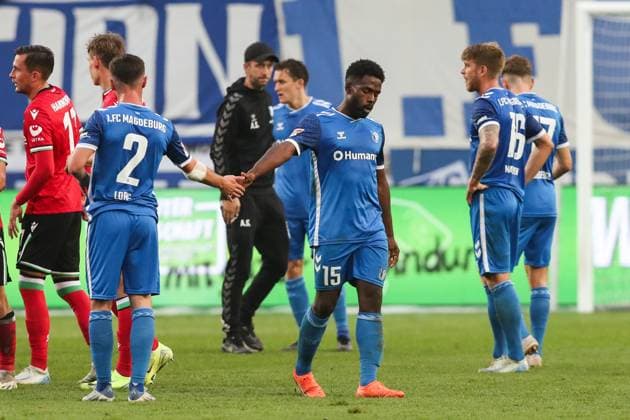 Daniel Heber 1 FC Magdeburg,15 with Samuel Loric 1 FC Magdeburg,2 2 Soccer Bundesliga Season 2024 2025 1 FC Magdeburg vs Hannover 96 at the Avnet Arena in Magdeburg Action,Soccer,Man,Men,Germany,27 10 2024