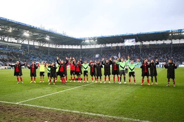 The Hannover 96 team cheers after the match in front of the fan block 2 Soccer Bundesliga season 2024 2025 1 FC Magdeburg vs Hannover 96 at the Avnet Arena in Magdeburg Action,Soccer,Man,Men,Germany,27 10 2024