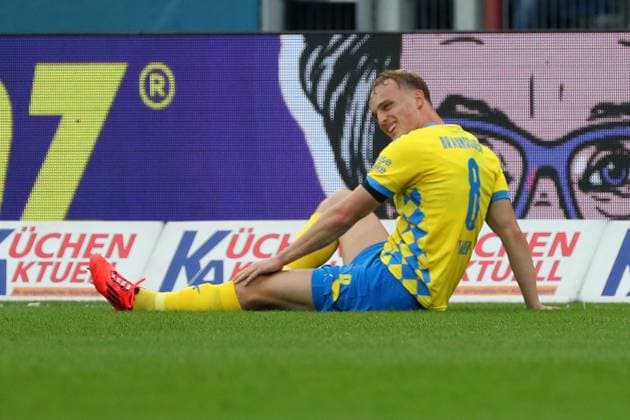 Braunschweig vs Münster, 2 BL Braunschweig, 27 10 2024, FOOTBALL Eintracht Braunschweig vs SC Preußen Münster, 2 BL, season 2024 25 Niklas Tauer Eintracht Braunschweig sits injured on the ground Braunschweig