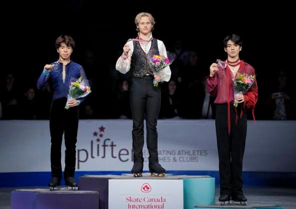 Shun Sato of Japan, Ilia Malinin of the U.S. and Junhwan Cha of Korea pose on the podium at the ISU Figure skating, Eiskunstlauf Skate Canada competition on October 27, 2024 in Halifax, Canada. Kalinin won the competition. Noxthirdxpartyxsales  (271370085)