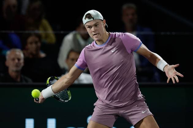 Paris, 29 10 2024 Tennis Rolex Paris Masters 2024, Matteo Arnaldi ITA Holger Rune v l , Holger Rune DK plays a forehand Copyright: AntonioxBorga