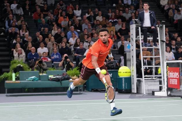 October 30, 2024, Paris, France: ARTHUR FILS (FRA) returns the ball to JAN LENNARD STRUFF (GER) during the day three of Rolex Paris Masters 1000 tournament at Paris Accor Arena Stadium in Paris France..Fils won 6:3 6:4 Paris France - ZUMAp119 20241030_zaf_p119_052 Copyright: xPierrexSteveninx