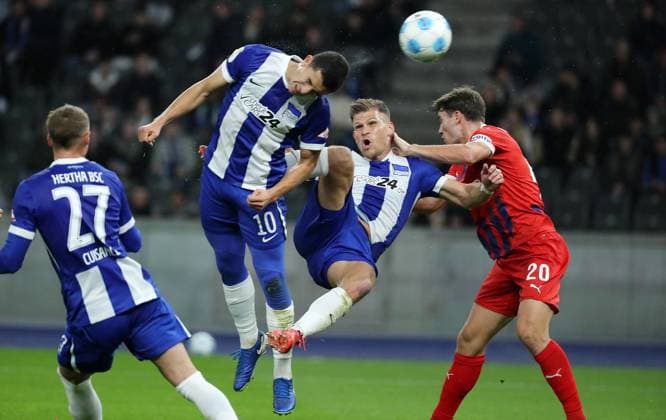 Ibrahim Maza obstructs Florian Niederlechner, Luka Kerber duel Match scene Action Sport Football Soccer DFB Pokal Herren 2 Runde Saison 2024 2025 30 10 2024 Hertha BSC Berlin vs 1 FC Heidenheim DFL regulations prohibit any use of photographs as image sequences and or quasi video