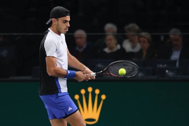 October 31, 2024, Paris, France: FRANCISCO CERUNDOLO (ARG) returns the ball to STEFANOS TSITSIPAS (GRE) during the round of sixteen of Rolex Paris Masters 1000 tournament at Paris Accor Arena Stadium in Paris France Paris France - ZUMAp119 20241031_zaf_p119_002 Copyright: xPierrexSteveninx
