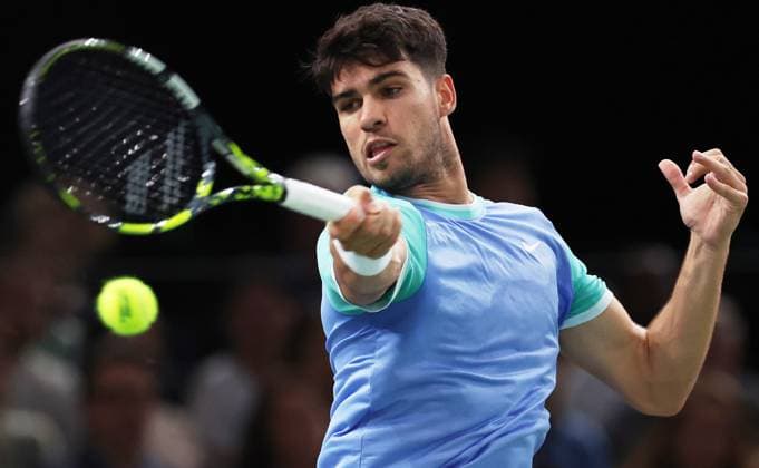 (241101) -- PARIS, Nov. 1, 2024 -- Carlos Alcaraz of Spain returns a shot during the singles round of 16 match between Carlos Alcaraz of Spain and Ugo Humbert of France at Paris ATP, Tennis Herren Masters 1000 tennis tournament in Paris, France, Oct. 31, 2024. ) (SP)FRANCE-PARIS-TENNIS-ATP-MASTERS GaoxJing 