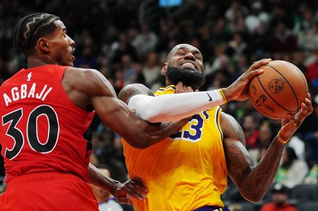 November 1, 2024, Toronto, On, Canada: Toronto Raptors Ochai Agbaji (30) fouls Los Angeles Lakers LeBron James (23) during second half NBA, Basketball Herren, USA basketball action in Toronto on Friday, November 1, 2024. Canada News - November 1, 2024  - ZUMAc35_ 20241101_zaf_c35_103 Copyright: xFrankxGunnx