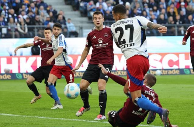 GER, 2 Liga, Hamburger SV vs 1 FC Nuernberg 03 11 2024, Volksparkstadion, Hamburg, GER, 2 Liga, Hamburger SV vs 1 FC Nuernberg in the picture picture shows Davie Selke Hamburger SV 27 shoots at Ondrej Karafiat 1 FC Nuernberg 44 nordphotoxGmbHx xTauchnitz nph00059