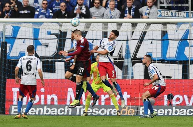 GER, 2 Liga, Hamburger SV vs 1 FC Nuernberg 03 11 2024, Volksparkstadion, Hamburg, GER, 2 Liga, Hamburger SV vs 1 FC Nuernberg in the picture picture shows duel header header duel between Davie Selke Hamburger SV 27 and Ondrej Karafiat 1 FC Nuernberg 44 right Daniel Elfadli Hamburger SV 08 nordphotoxGmbHx xTauchnitz nph00059