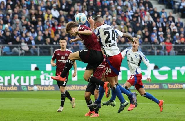 GER, 2 Liga, Hamburger SV vs 1 FC Nuernberg 03 11 2024, Volksparkstadion, Hamburg, GER, 2 Liga, Hamburger SV vs 1 FC Nuernberg in the picture picture shows duel header header duel between Finn Jeltsch 1 FC Nuernberg 04 and Lucas Perrin Hamburger SV 24 nordphotoxGmbHx xTauchnitz nph00059