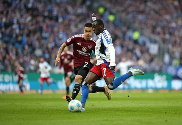 03 11 2024, Soccer 2 Bundesliga 2024 2025, Matchday 11, Hamburger SV 1 FC Nürnberg , at Volksparkstadion Hamburg L R Oliver Villadsen Nürnberg v Jean Luc Dompe Hamburg DFL and DFB regulations prohibit any use of photographs as image sequences and or quasi video