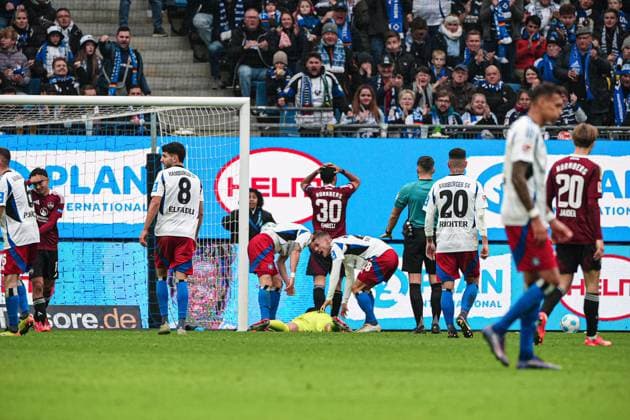 Noah Katterbach Hamburger SV, 33 and Jonas Meffert Hamburger SV, 23 celebrate parade Daniel Heuer Fernandes Hamburger SV, 01 GER, Hamburger SV vs 1 FC Nuernberg, Football, 2 Bundesliga, Matchday 11, Season 2024 2025, 03 11 2024 DFL REGULATES PROHIBIT ANY USE OF PHOTOGRAPHS AS IMAGE SEQUENCES AND OR QUASI VIDEO GER, Hamburger SV vs 1 FC Nuernberg, Football, 2 Bundesliga, Matchday 11, Season 2024 2025, 03 11 2024 Hamburg Copyright: xEibner-Pressefoto MarcelxvonxFehrnx EP_MFN