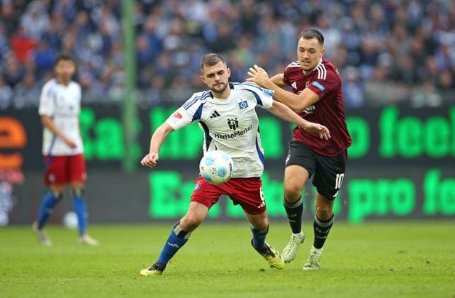 03 11 2024, Soccer 2 Bundesliga 2024 2025, Matchday 11, Hamburger SV 1 FC Nürnberg , at Volksparkstadion Hamburg L R Lukasz Poreba Hamburg vs Julian Justvan Nürnberg DFL and DFB regulations prohibit any use of photographs as image sequences and or quasi video