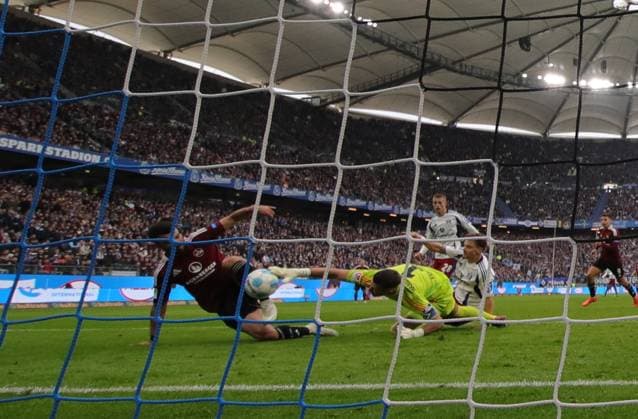 GER, 2 Liga, Hamburger SV vs 1 FC Nuernberg 03 11 2024, Volksparkstadion, Hamburg, GER, 2 Liga, Hamburger SV vs 1 FC Nuernberg in the picture picture shows Goalkeeper save by goalkeeper Daniel Heuer Fernandes Hamburger SV 01 after toe shot by Mahir Emreli 1 FC Nuernberg 30 captured with the Rear Goal Remote camera nordphotoxGmbHx xTauchnitz nph00059