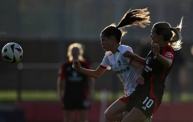 November 3, 2024, NoÂ¼Rnberg, Bayern, Germany: Women against the Sun. Slhouetted Medina Desic (right, Fcn ) and Charlotte Emilie Schmit ( left, Freiburg ) fight for the Ball during the 2.Bundesliga Women Soccer match between 1.FCN Nuernberg and Freiburg II in the Sportpark Valznerweiher Stadium in Nuernberg , Bayern , Germany. November 03rd, 2024 NoÂ¼Rnberg Germany - ZUMAe140 20241103_zip_e140_001 Copyright: xDavidexEliasx
