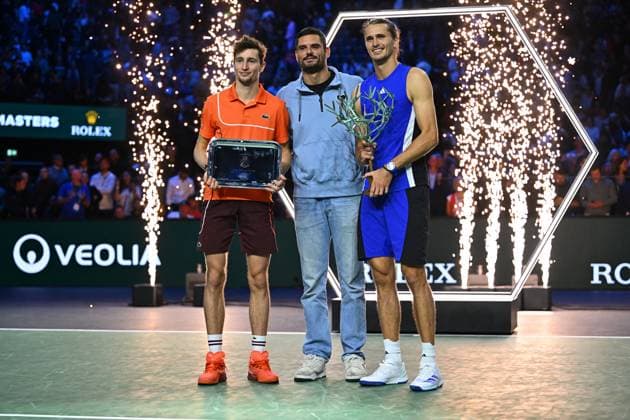 Final Of The Rolex Paris Masters Swimmer Floran Manodou with Alexander Zverev (GER) posing with his trophy next to Ugo Humbert (FRA) at the 2024 Rolex Paris Masters at the Accor Arena in Paris, France, on November 3, 2024. Photo by Corinne Dubreuil ABACAPRESS.COM Paris France  Copyright: xDubreuilxCorinne ABACAx