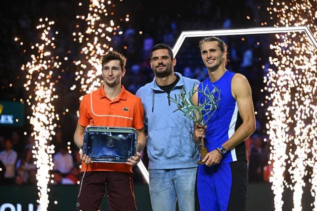 Final Of The Rolex Paris Masters Swimmer Floran Manodou with Alexander Zverev (GER) posing with his trophy next to Ugo Humbert (FRA) at the 2024 Rolex Paris Masters at the Accor Arena in Paris, France, on November 3, 2024. Photo by Corinne Dubreuil ABACAPRESS.COM Paris France  Copyright: xDubreuilxCorinne ABACAx