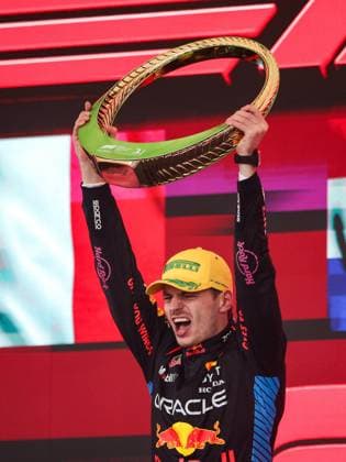 VERSTAPPEN Max (ned), Red Bull Racing RB20, portrait celebrates the victory in podium trophy during the Formula 1 Grande Premio de Sao Paulo 2024, 21th round of the 2024 Formula One World Championship, WM, Weltmeisterschaft from November 1 to 3, 2024 on the Interlagos Circuit, in Sao Paulo, Brazil - F1 - SAO PAULO GRAND PRIX 2024 DPPI Panoramic  241103_R21_BRASILE_DP_XB3_5278_1