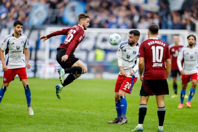 Hamburg, 3 November 2024 Football, 2 Bundesliga 2024 25, Hamburger SV 1 FC Nürnberg Lukas Schleimer 1 FC Nürnberg, 36 , Marco Richter Hamburger SV, 20 DFL REGULATIONS PROHIBIT ANY USE OF PHOTOGRAPHS AS IMAGE SEQUENCES AND OR QUASI VIDEO