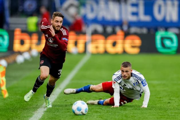 Hamburg, 3 November 2024 Football, 2 Bundesliga 2024 25, Hamburger SV 1 FC Nürnberg Lukas Schleimer 1 FC Nürnberg, 36 , Miro Muheim Hamburger SV, 28 DFL REGULATIONS PROHIBIT ANY USE OF PHOTOGRAPHS AS IMAGE SEQUENCES AND OR QUASI VIDEO