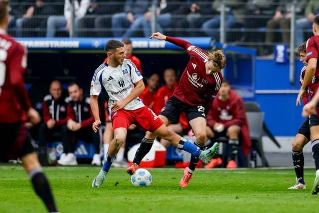 Hamburg, 3 November 2024 Football, 2 Bundesliga 2024 25, Hamburger SV 1 FC Nürnberg William Mikelbrencis Hamburger SV, 2 , Caspar Jander 1 FC Nürnberg, 20 DFL REGULATIONS PROHIBIT ANY USE OF PHOTOGRAPHS AS IMAGE SEQUENCES AND OR QUASI VIDEO