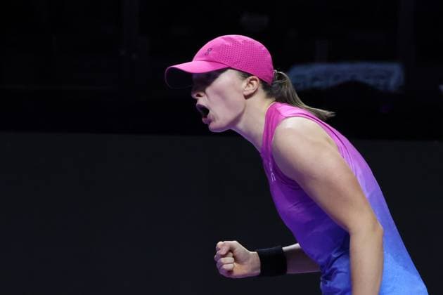 (241104) -- RIYADH, Nov. 4, 2024 -- Iga Swiatek of Poland celebrates for scoring during the round robin match against Barbora Krejcikova of the Czech Republic at WTA, Tennis Damen Finals tennis tournament in Riyadh, Saudi Arabia, Nov. 3, 2024. ) (SP)SAUDI ARABIA-RIYADH-TENNIS-WTA FINALS-DAY 2 LuoxChen 