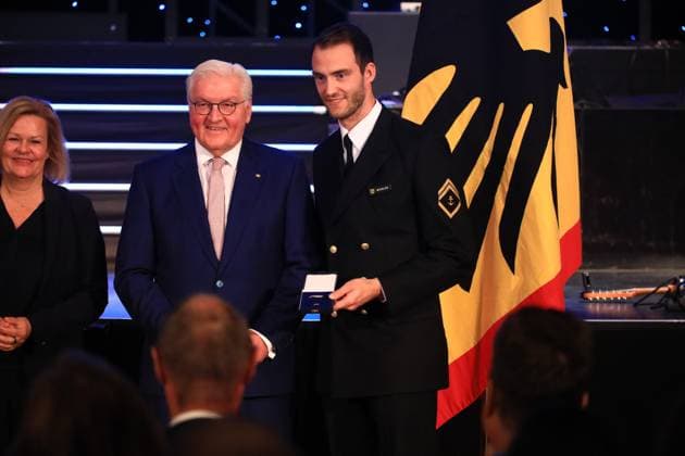 Presentation of the Silver Laurel Leaf Berlin, 04 11 2024 Federal President Frank Walter Steinmeier awards the Silver Laurel Leaf to athletes who won medals at the 2024 Olympic Games in Paris The award is presented by the Federal President right and Interior Minister Nancy Faeser left to Beach Volleyball Clemens Wickler, Hamburg Silver, Men Berlin Germany Copyright: xMatthiasxGränzdörferx