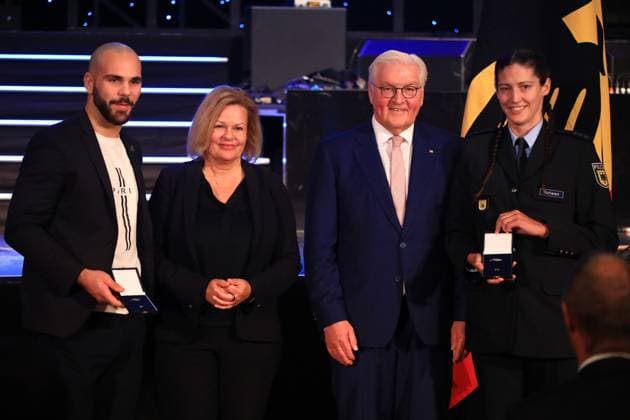 Presentation of the Silver Laurel Leaf Berlin, 04 11 2024 Federal President Frank Walter Steinmeier awards the Silver Laurel Leaf to athletes who won medals at the 2024 Olympic Games in Paris The award is presented by the Federal President right and Interior Minister Nancy Faeser left to Judo Miriam Butkereit, Frechen Silver, 70 kg, Lennart Marius Sass, Heidelberg Bronze, 73 kg Berlin Germany Copyright: xMatthiasxGränzdörferx