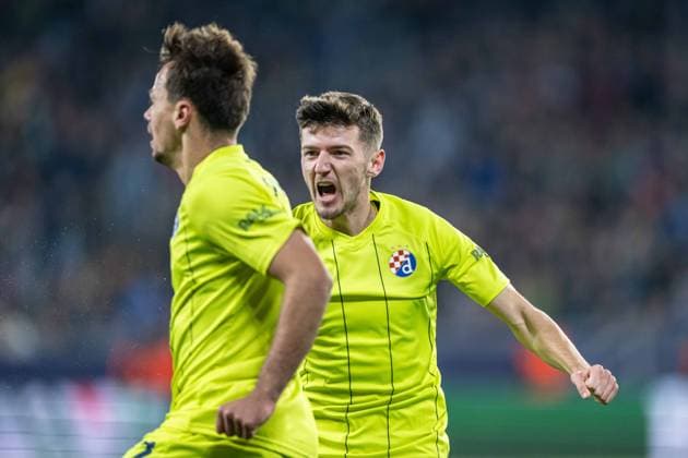 GNK Dinamo Zagreb players a goal celebrate during UEFA Champions league match, SK Slovan Bratislava - GNK Dinamo Zagreb , 05. november 2024, Tehelne pole Stadium, Bratislava, Slovakia Copyright: xMICHALxFAJT,ZOSPORTU.SKx DSC_4157