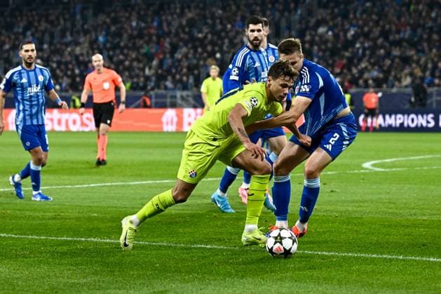 SK Slovan Bratislava v GNK Dinamo - UEFA Champions League 2024 25 League Phase MD4 Dario Spikic of Dinamo Zagreb competes for the ball with Siemen Voet of Slovan Bratislava during the UEFA Champions League 2024 25 League Phase MD4 match between SK Slovan Bratislava and GNK Dinamo at National football stadium on November 5, 2024 in Bratislava, Slovakia.  MarkoxLukunic PIXSELL