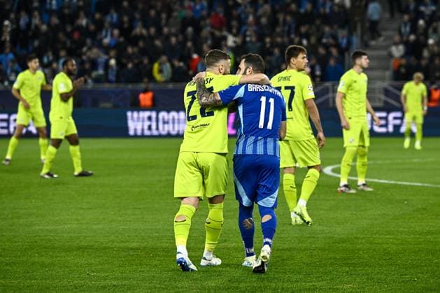 SK Slovan Bratislava v GNK Dinamo - UEFA Champions League 2024 25 League Phase MD4 Stefan Ristovski of Dinamo Zagreb hugs Tigran Barseghyan of Slovan Bratislava prior to the UEFA Champions League 2024 25 League Phase MD4 match between SK Slovan Bratislava and GNK Dinamo at National football stadium on November 5, 2024 in Bratislava, Slovakia.  MarkoxLukunic PIXSELL