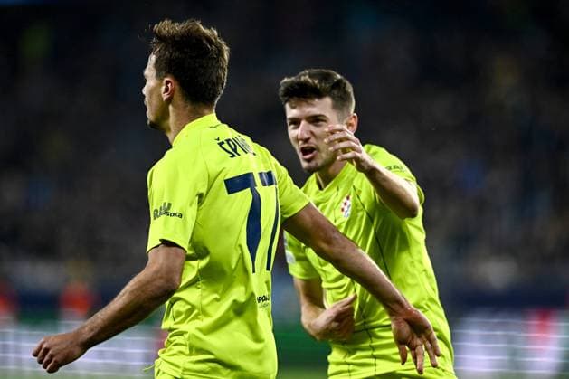SK Slovan Bratislava v GNK Dinamo - UEFA Champions League 2024 25 League Phase MD4 Players of Dinamo Zagreb Dario Spikic and Pear Sucic celebrate after scoring first goal during the UEFA Champions League 2024 25 League Phase MD4 match between SK Slovan Bratislava and GNK Dinamo at National football stadium on November 5, 2024 in Bratislava, Slovakia.  MarkoxLukunic PIXSELL